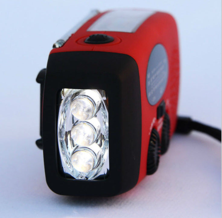 Güneş enerjili el kranklı USB şarjlı radyo el feneri