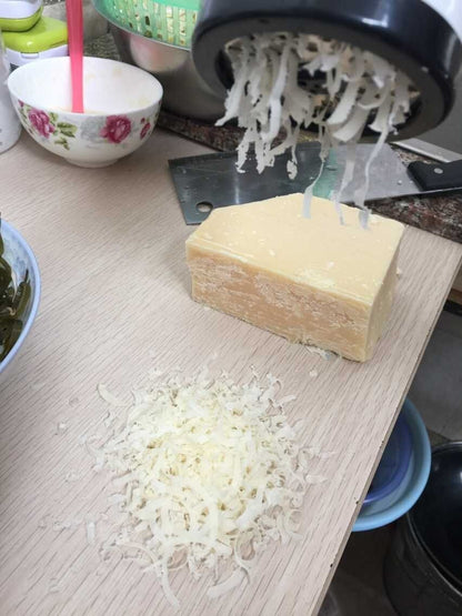 Chop Cheese With A Shredder rende